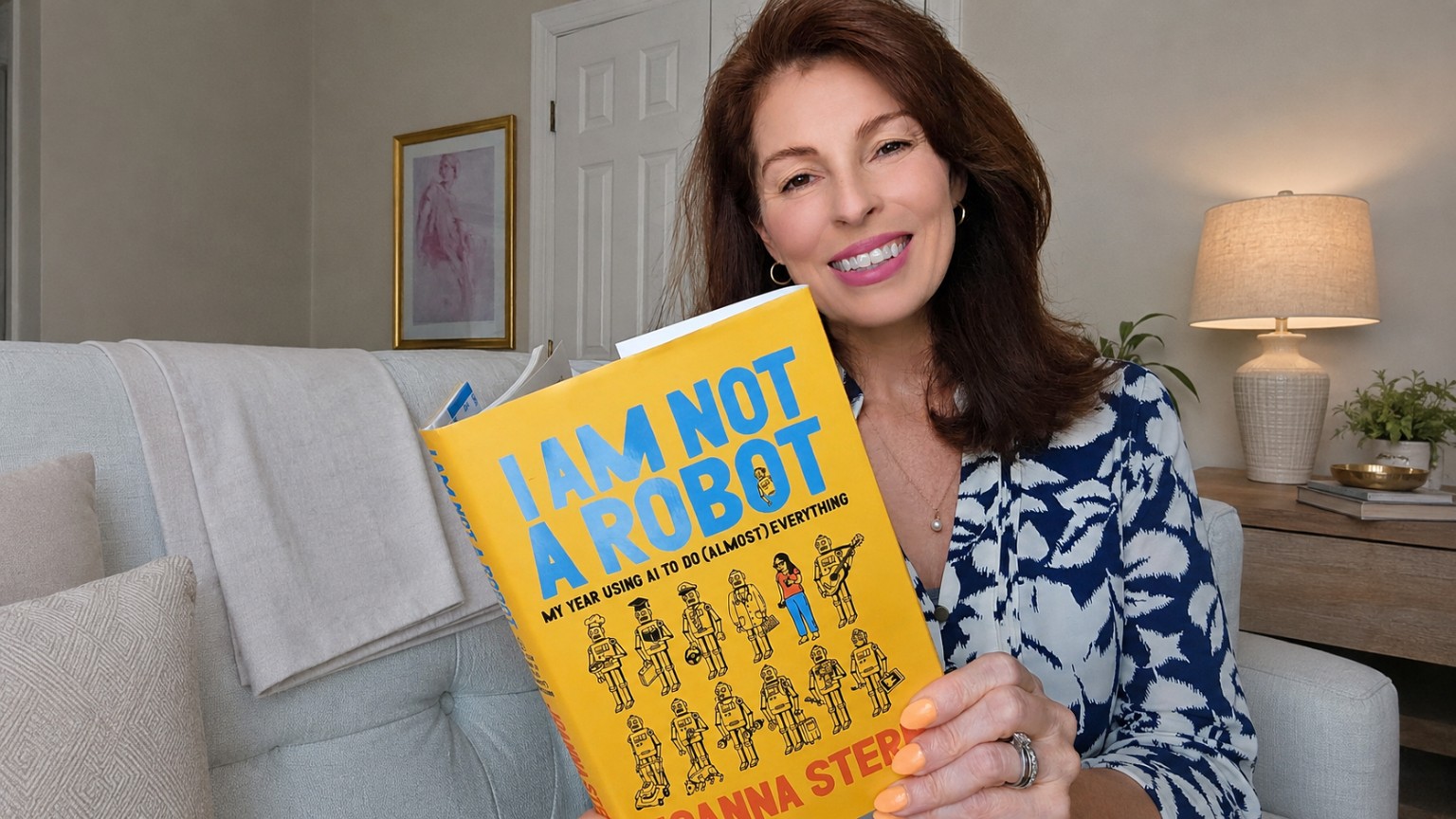 Cheyenne Dominguez holding the Book and Movie Club selection I Am Not a Robot
